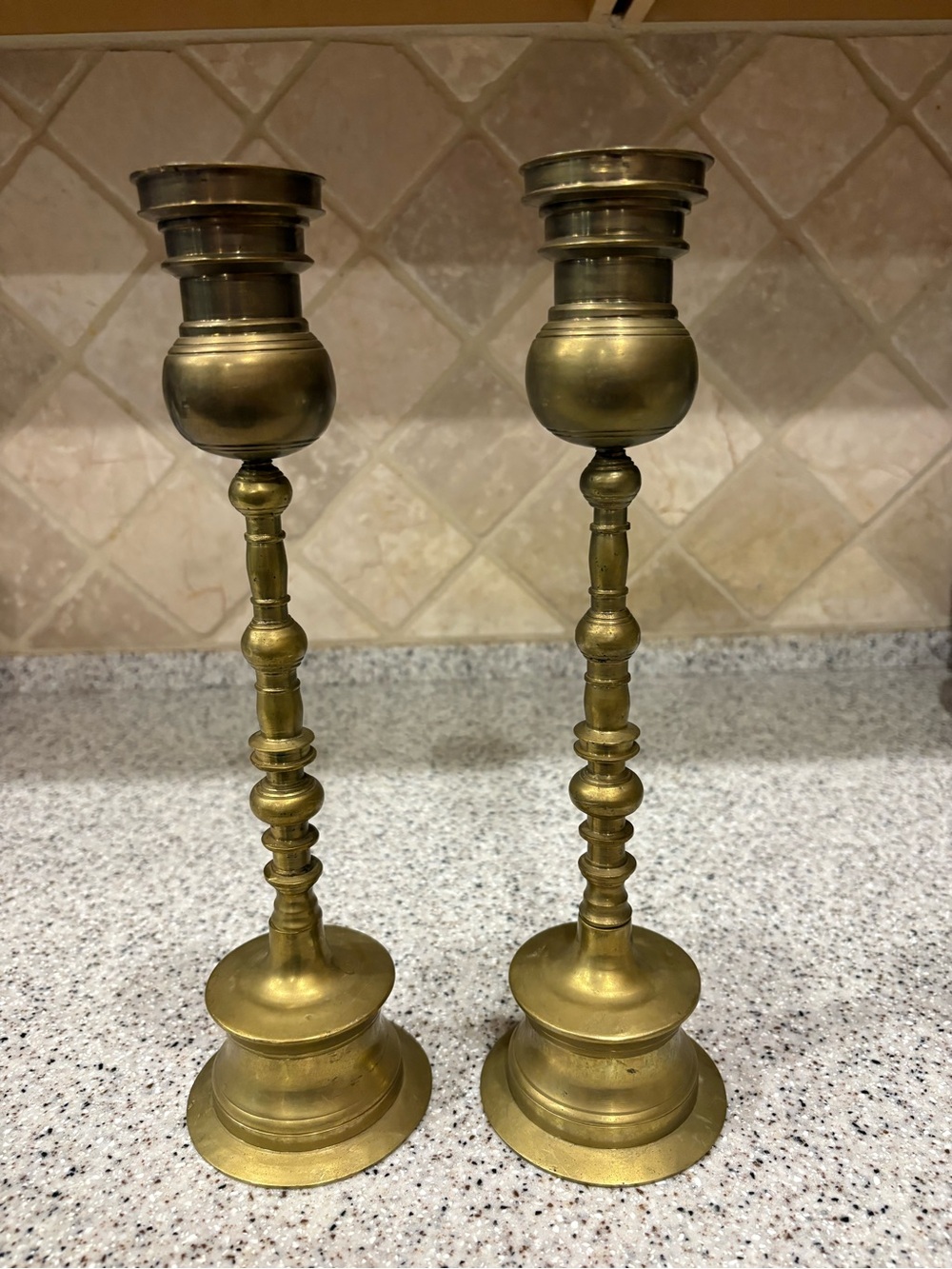 Vintage pair of turned solid brass candlestick holders